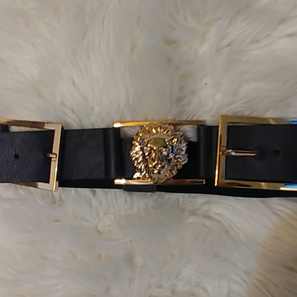 Black belt with gold lion emblem. - Picture 2 of 3